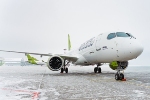 Foto: airBaltic saņem jaunāko Airbus A220-300 lidmašīnu